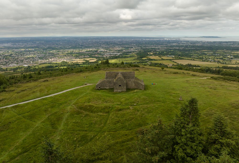 stone building in field 