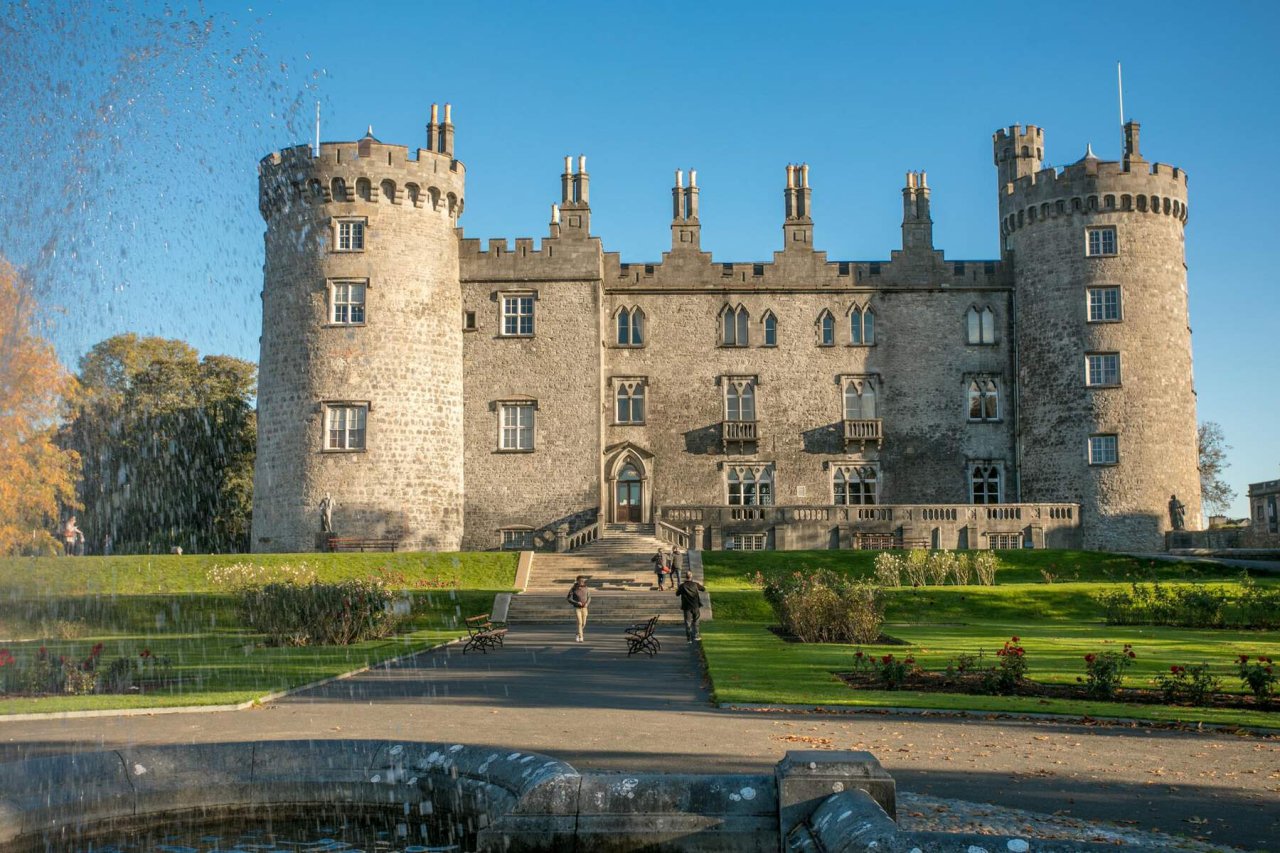 stone castle in front of grass area